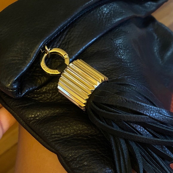 India Hicks Carmen fold over Black Leather Clutch with tassel - Picture 2 of 8